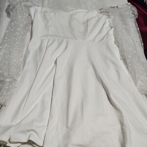 Elegant White Dress with Sheer Polka Dot Sleeves
